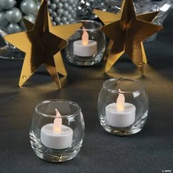 Battery-Operated Tea Light Candles - 12 Pc. 9 Battery-Operated Tea Light Candles - 12 Pc. -Party Decorations Sales Shop white battery operated tea light candles 12 pc 91 5004 a02